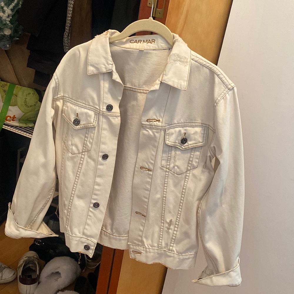 Distressed denim jacket